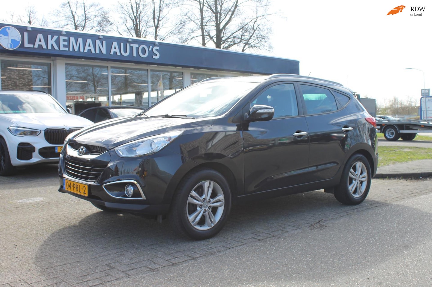 Hyundai ix35 - 2.0i Style Automaat Blackline Navi Huurkoop Inruil APK Garantie - AutoWereld.nl