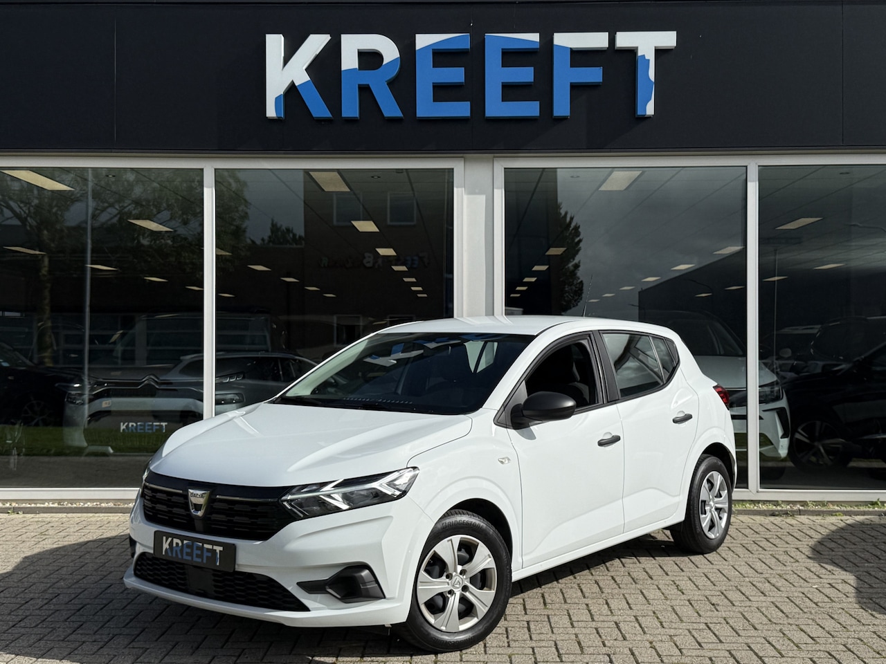 Dacia Sandero - 1.0 TCe 90 Essential Airco | Cruise control - AutoWereld.nl