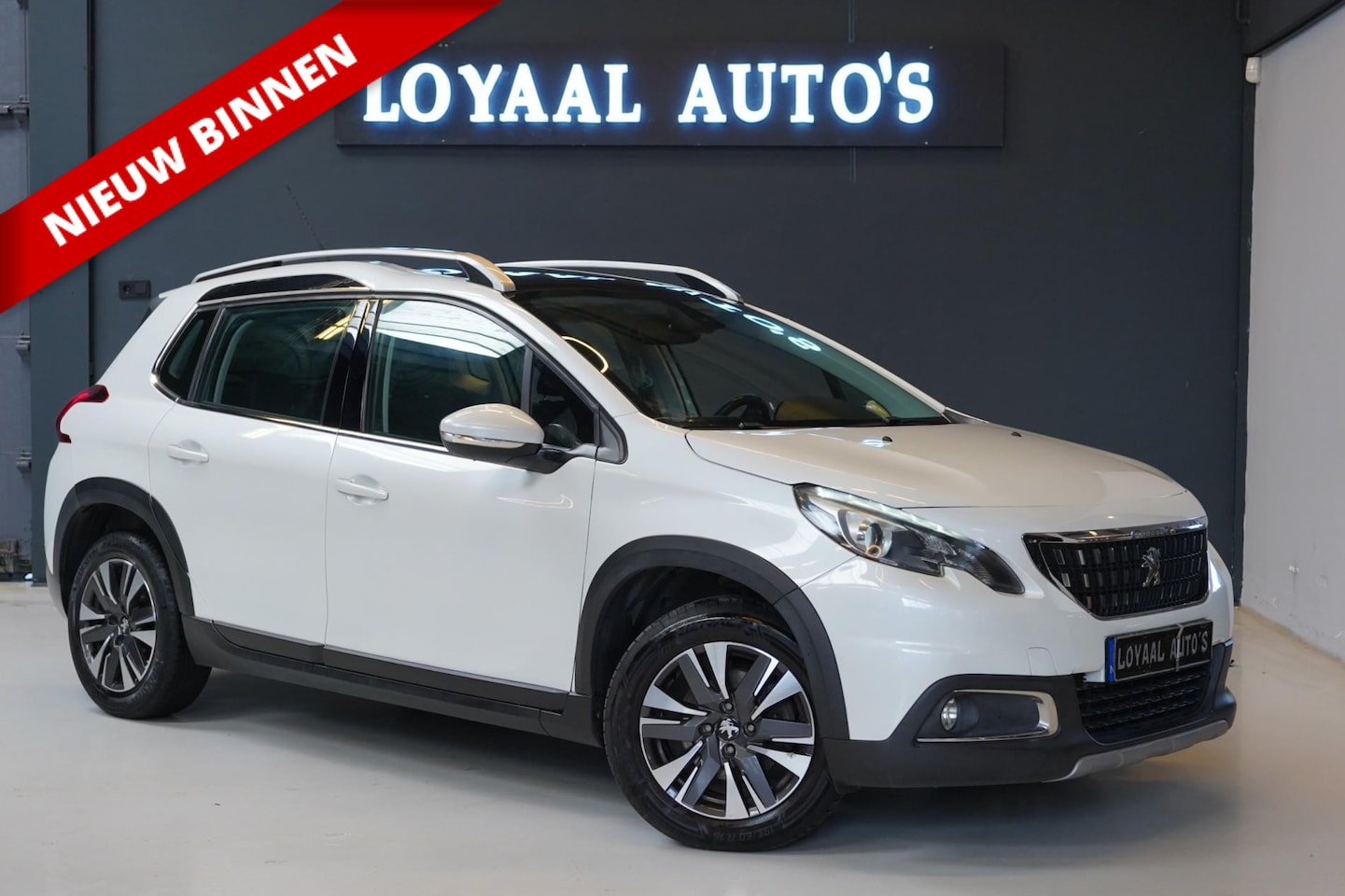 Peugeot 2008 - 1.2 PureTech Allure | NAVI | PANODAK | TREKHAAK | CRUISE | PDC | NAP | APK. - AutoWereld.nl