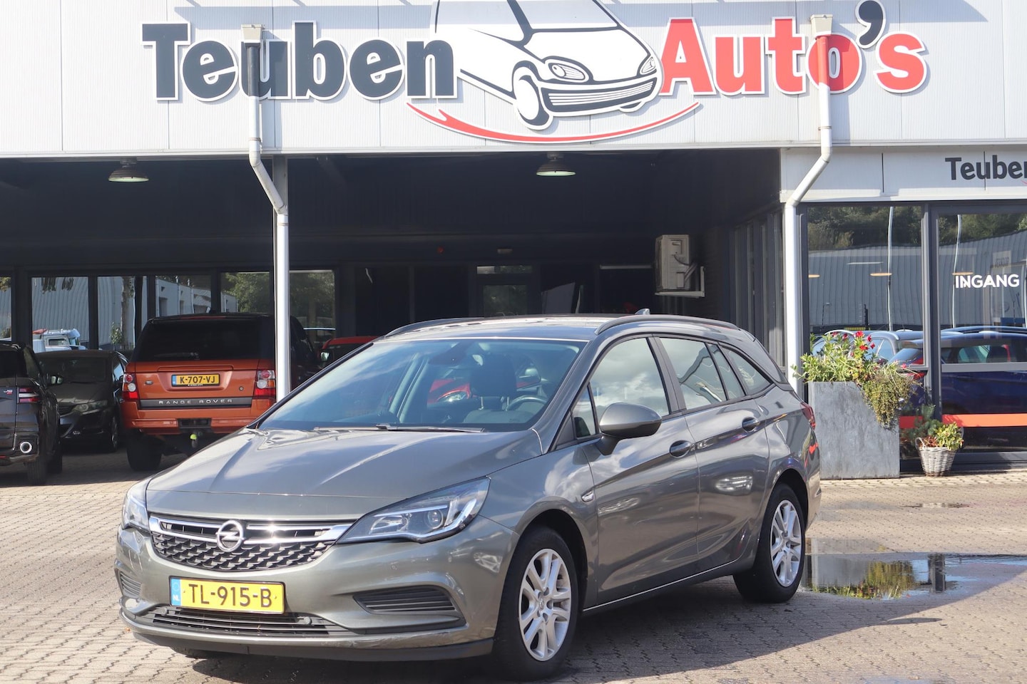 Opel Astra Sports Tourer - 1.0 Online Edition Navigatie, Airco, Cruise control, Trekhaak - AutoWereld.nl