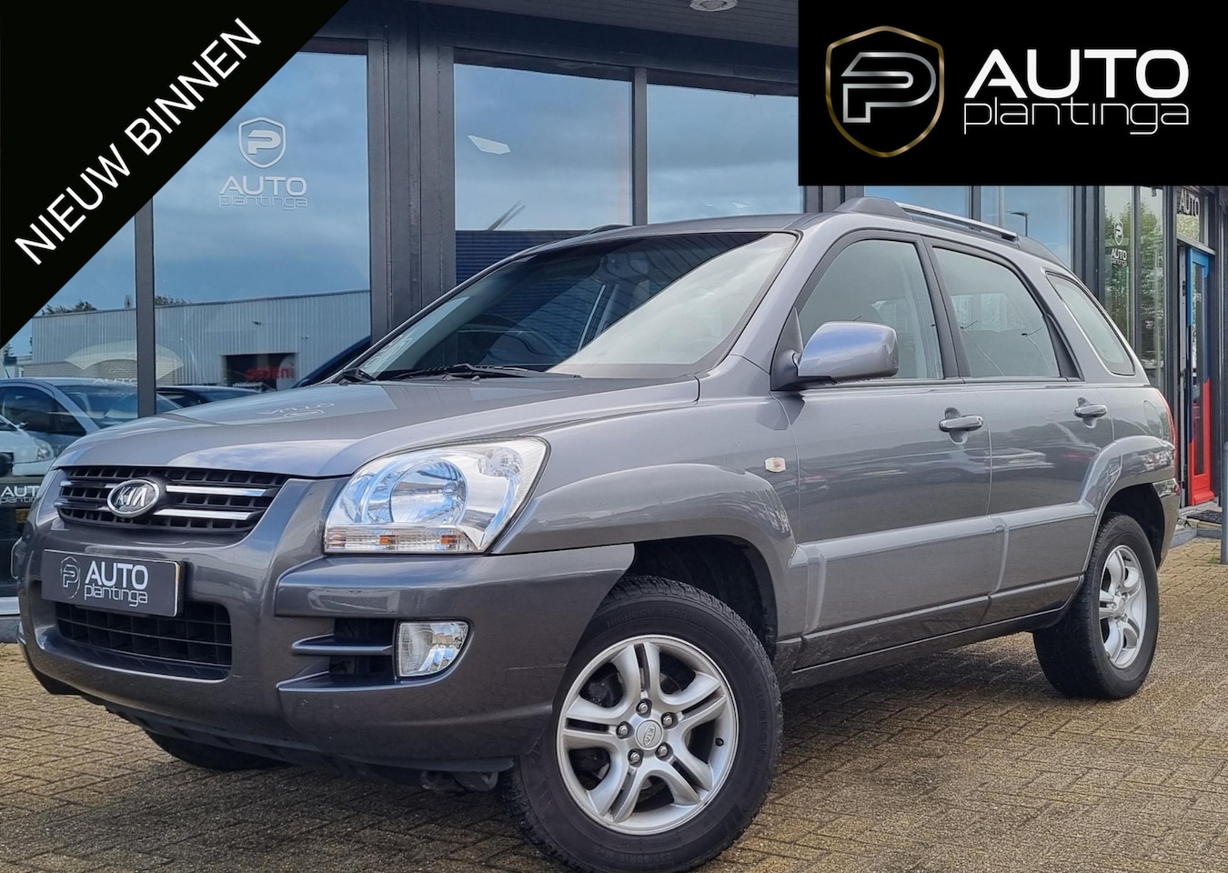 Kia Sportage - 2.0 CVVT Executive 141PK | Zeer Nette Staat! | Nieuwe D-Riem | Trekhaak | Cruise Control | - AutoWereld.nl