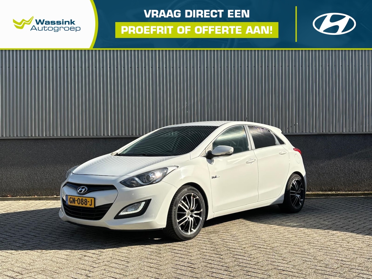 Hyundai i30 - 1.6 GDi Blue 135PK 5d i-Motion Plus I Bluetooth I Camera I Parkeersensoren I Navigatie - AutoWereld.nl