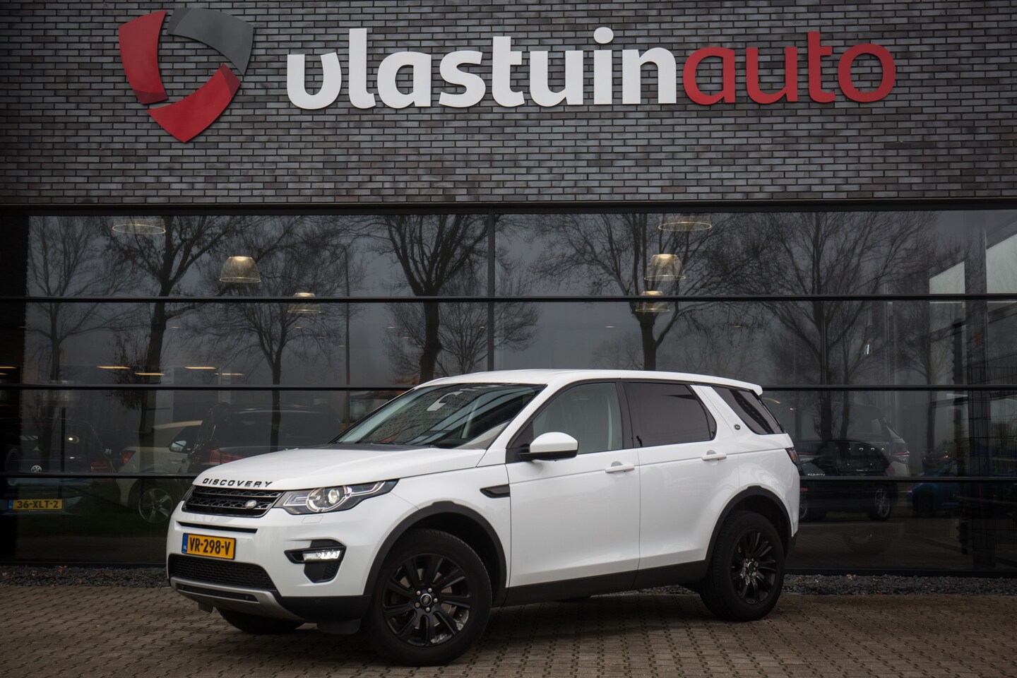 Land Rover Discovery Sport - , Grijs kenteken, Leer,  Achteruitrijcamera - AutoWereld.nl