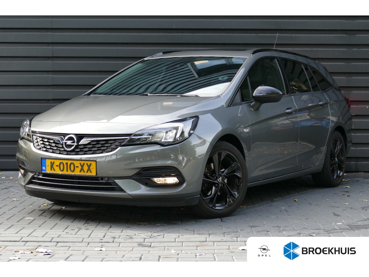 Opel Astra Sports Tourer - 1.2 TURBO 130PK BUSINESS ELEGANCE / NAVI / LED / CLIMA / PDC / 17"LMV / CAMERA / PANO.DAK - AutoWereld.nl