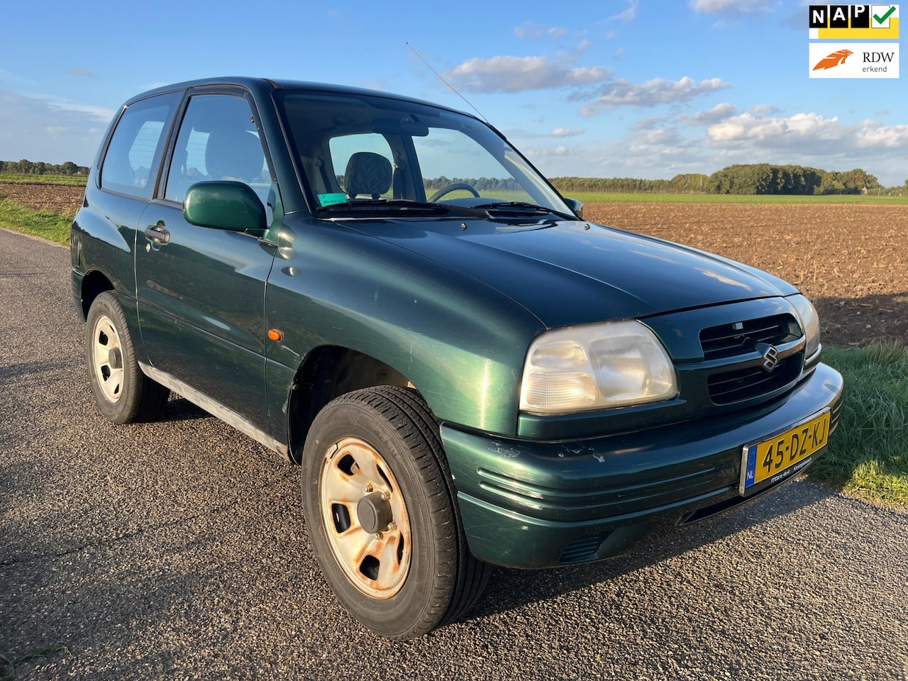 Suzuki Grand Vitara - 2.0 Metal Top |4x4|airco| - AutoWereld.nl