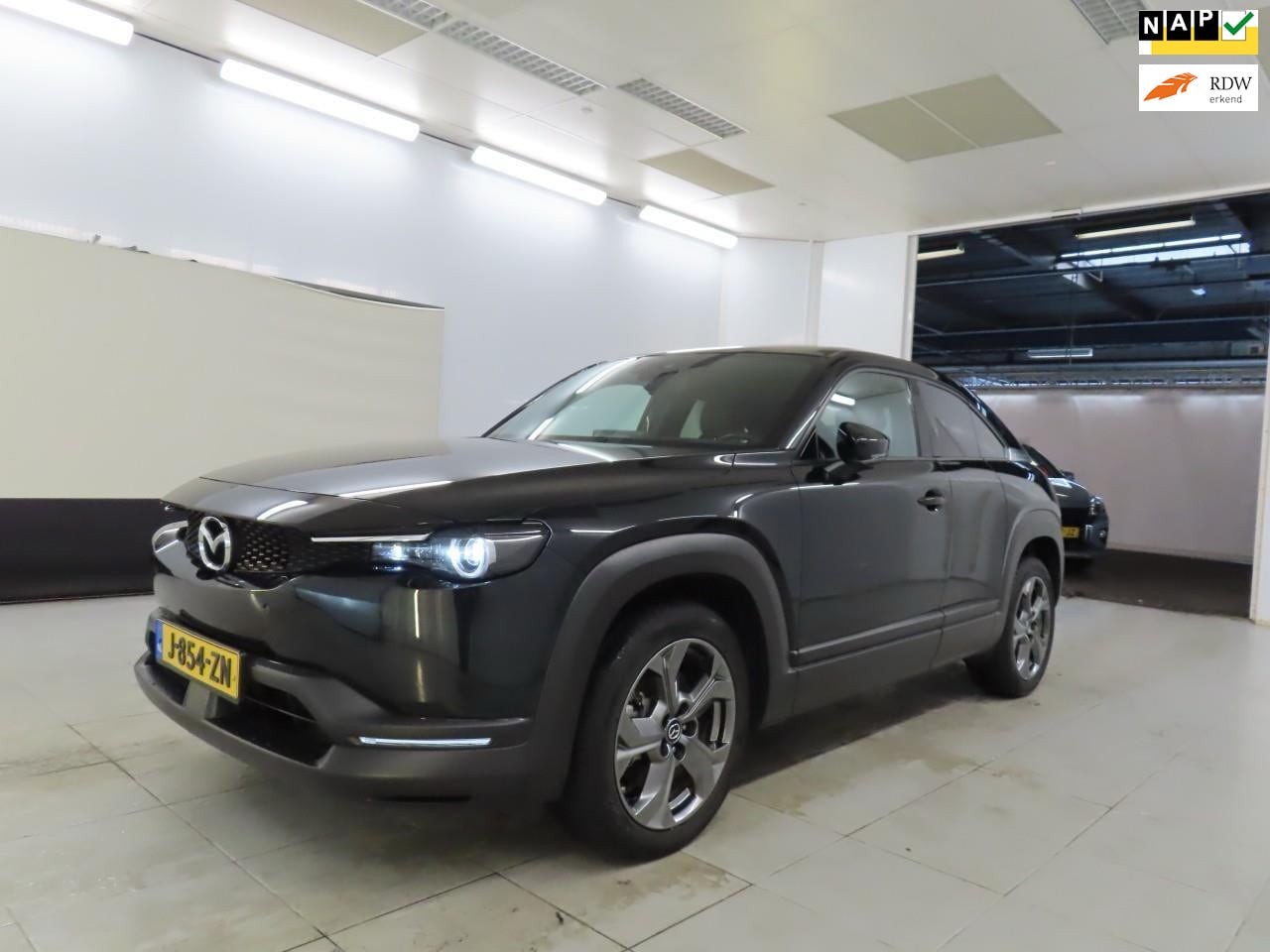 Mazda MX-30 - E-SkyActiv 145 First Edition 36 kWh | SOH 94% | Stoelverwarming | Cruise Control | Keyless - AutoWereld.nl