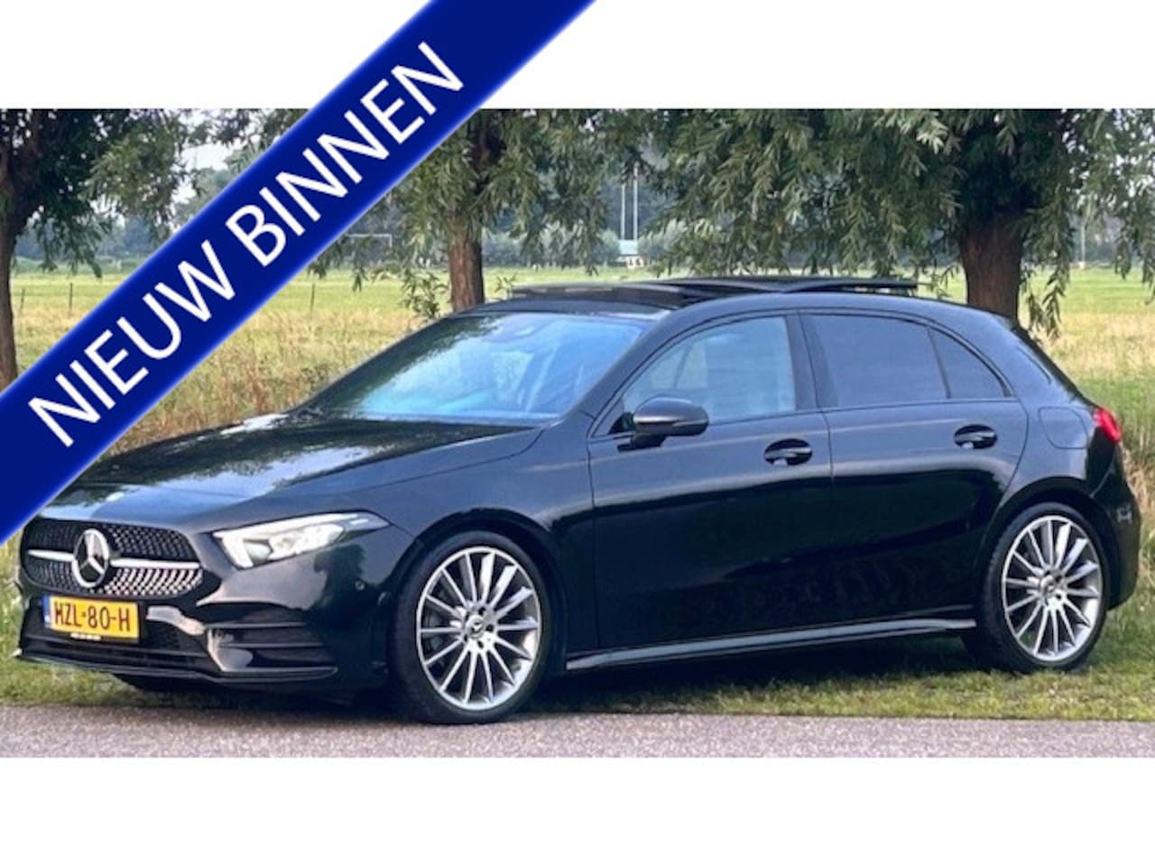 Mercedes-Benz A-klasse - 200 AMG-LINE NAVIGATIE WIDESCREEN, APPLE CARPLAY, DAB RADIO, LEER, STOELVERWARMING, AMBIËN - AutoWereld.nl