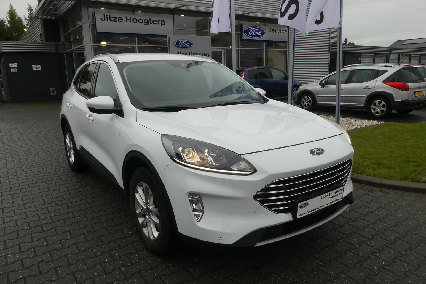 Ford Kuga - 2.5 PHEV Titanium ELEKT. TREKHAAK (1.500KG), WINTER PACK, CRUISE, CLIMA, NAVI, PDC V&A, CA - AutoWereld.nl