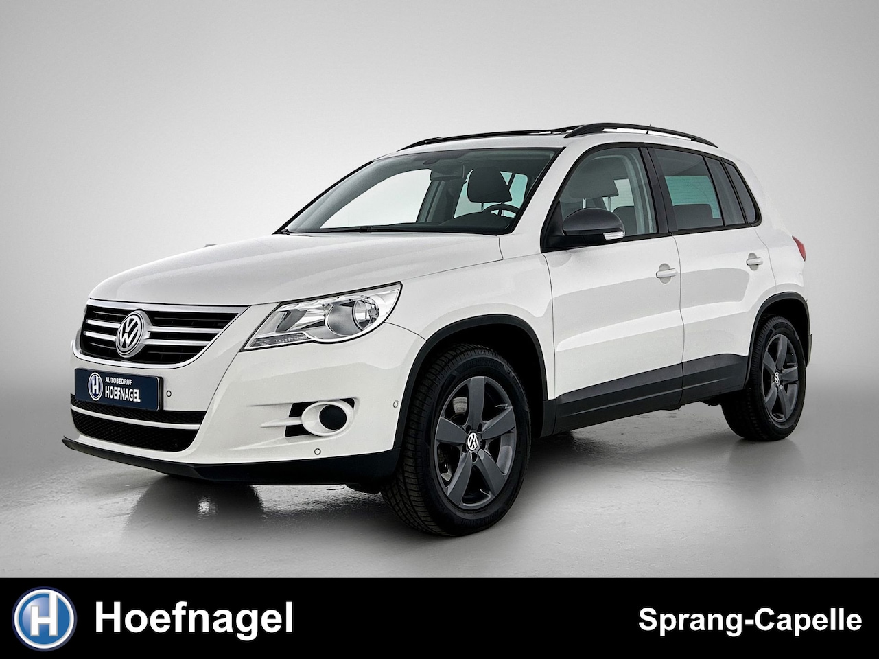 Volkswagen Tiguan - 1.4 TSI Comfort&Design 4Motion | Panodak | CarPlay | Trekhaak | - AutoWereld.nl
