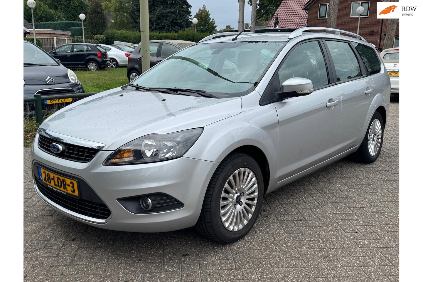 Ford Focus Wagon - 1.8 Limited Flexi Fuel - NAVIGATIE, TREKHAAK, KEYLESS, CRUISE CONTROL - AutoWereld.nl