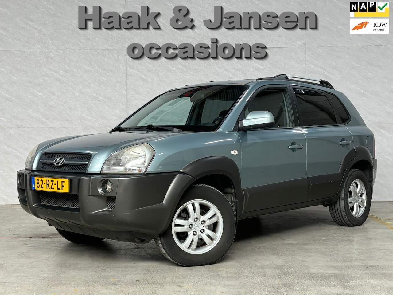 Hyundai Tucson - 2.0i Dynamic Airco E-ramen cruise - AutoWereld.nl