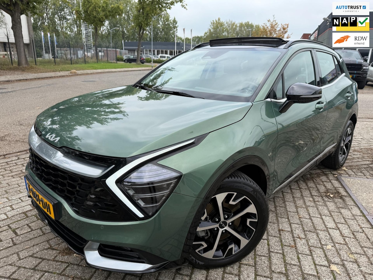 Kia Sportage - 1.6 T-GDi HYBRID DYNAMIC+LINE 2023 LUXE PANO ACC LUXE 1-EIGENR - AutoWereld.nl