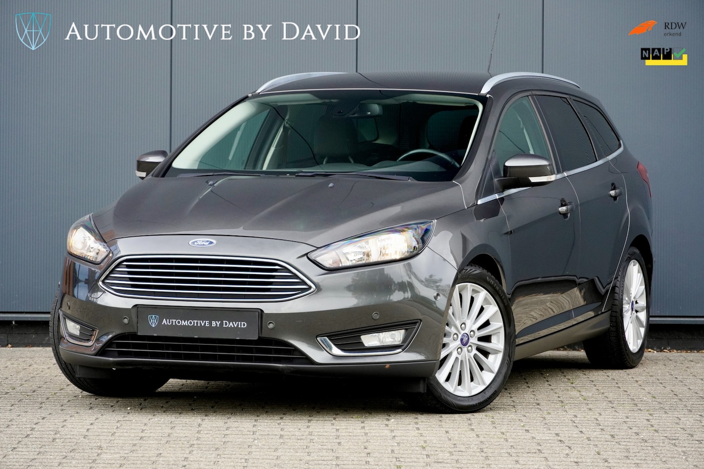 Ford Focus Wagon - 1.0 126 pk TITANIUM EDITION / NIEUWE DISTRIBUTIERIEM / TREKHAAK / NAVIGATIE / INPARKEERHUL - AutoWereld.nl