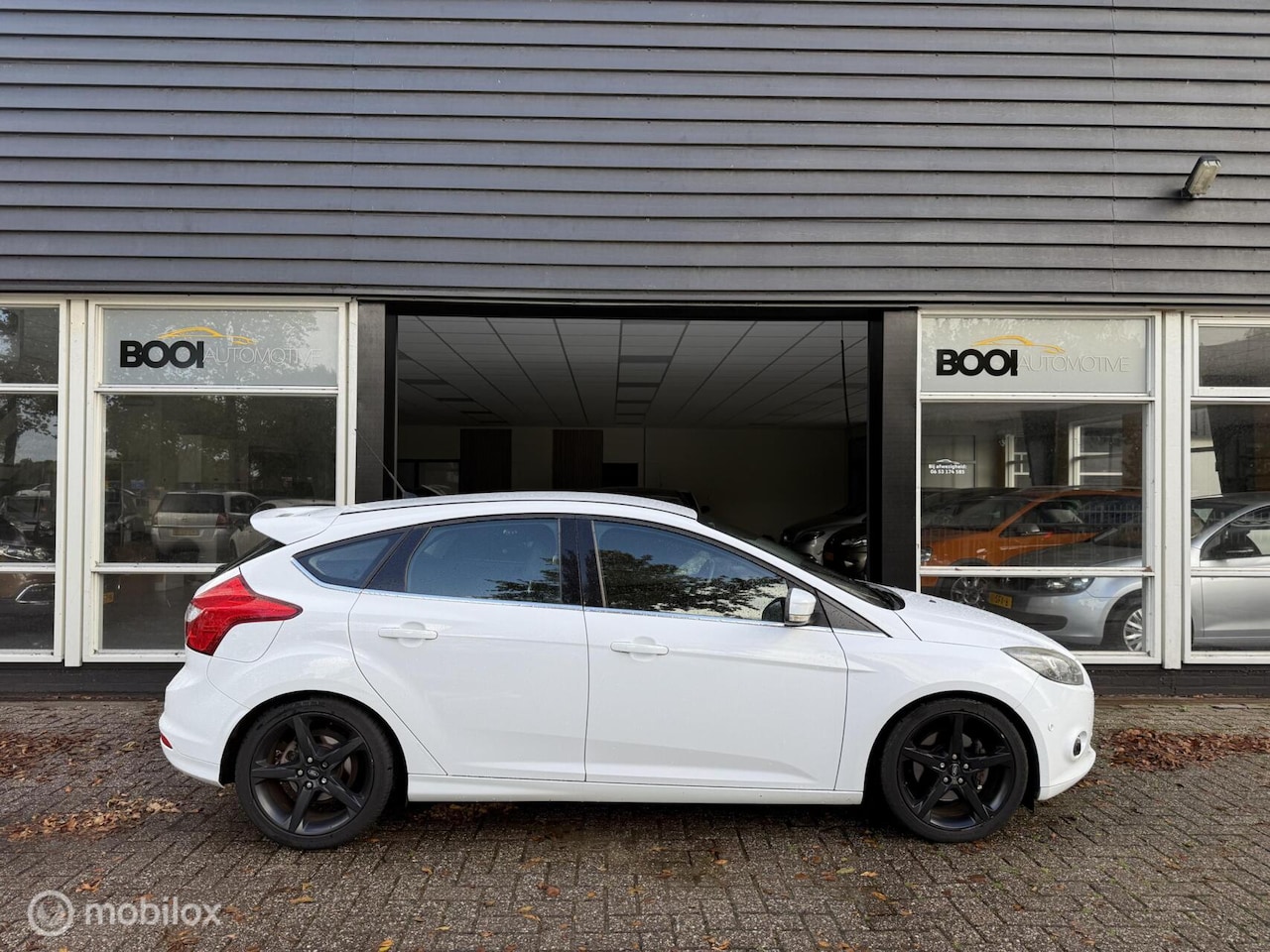 Ford Focus - 1.6 EcoBoost Titanium SPORT - AutoWereld.nl