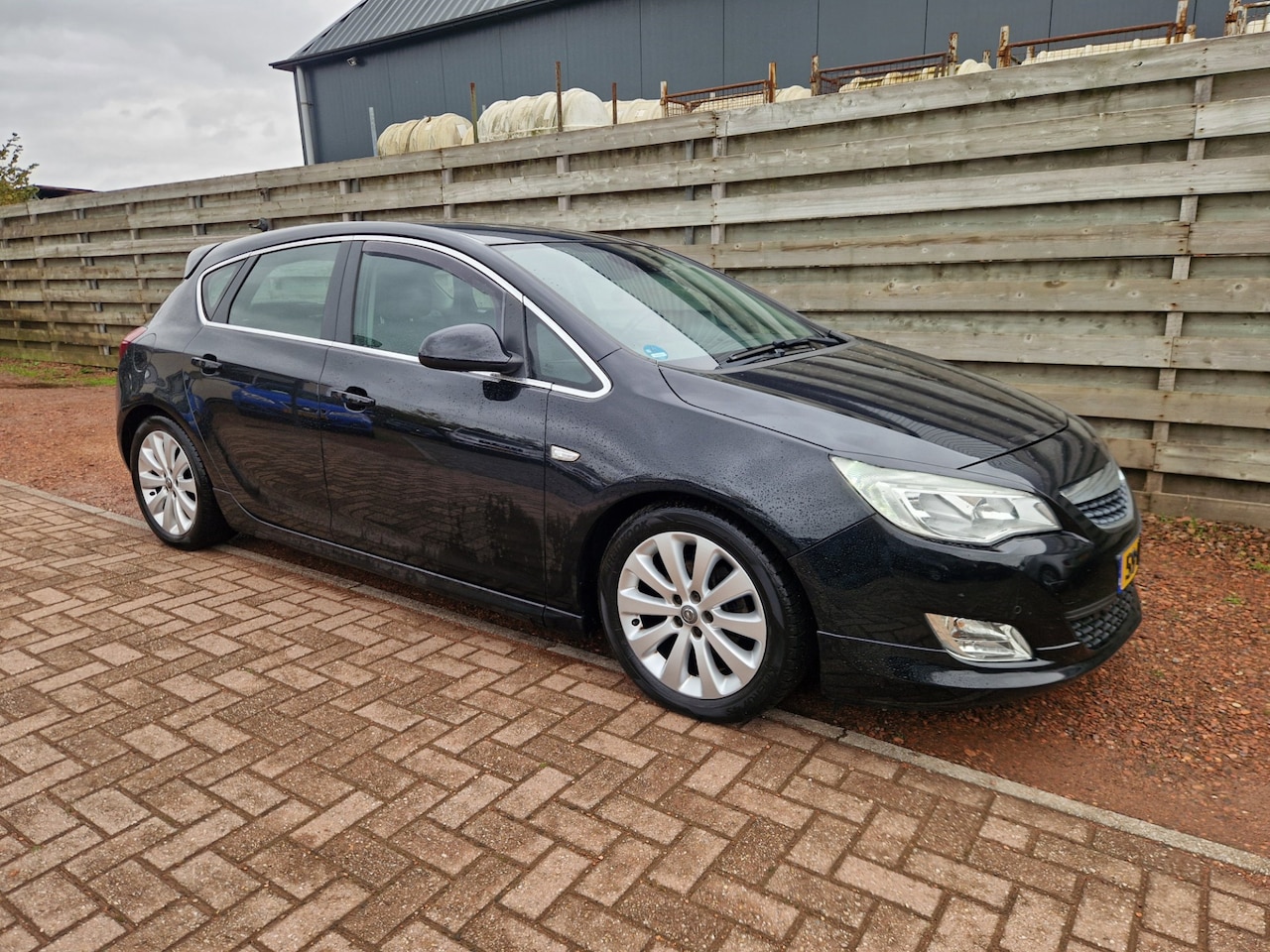 Opel Astra - 1.4 Turbo Cosmo Navigatie - AutoWereld.nl