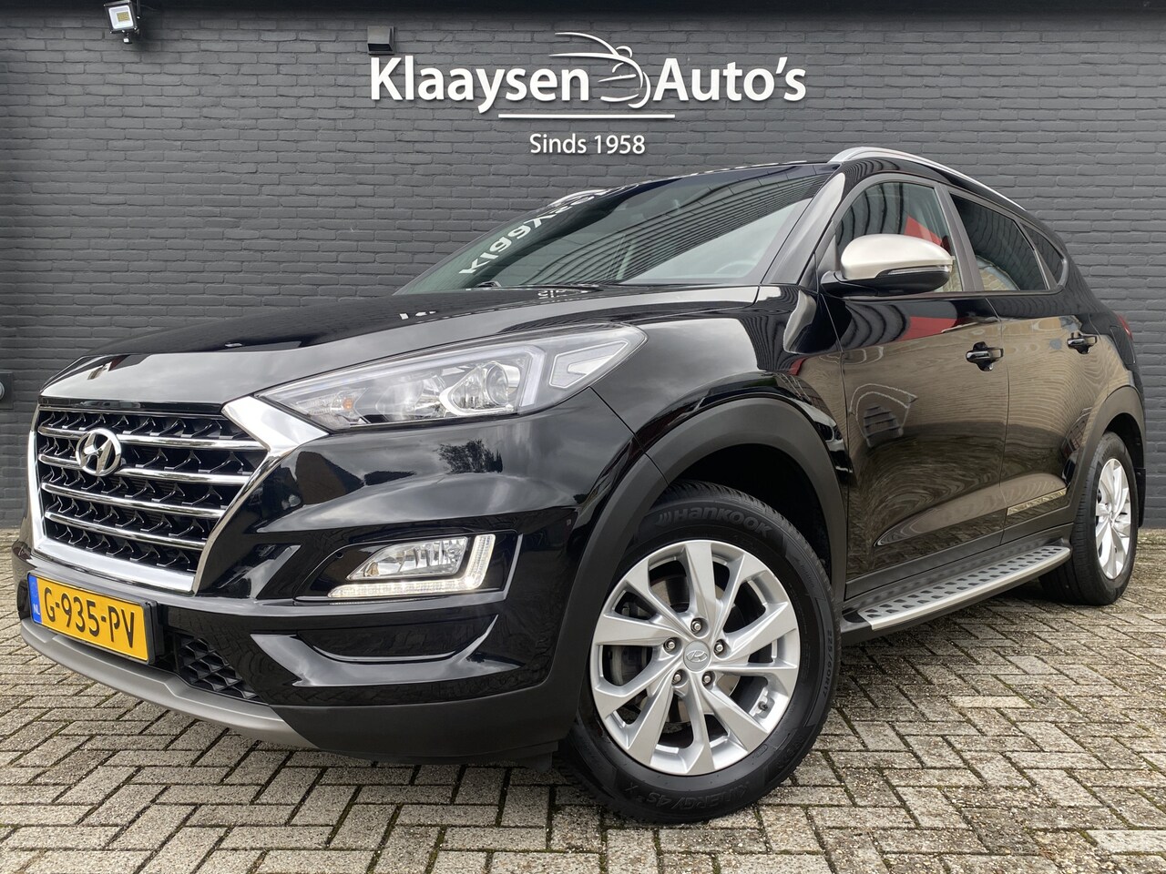 Hyundai Tucson - 1.6 T-GDI Comfort 177 pk AUT. | dealer onderhouden | navigatie | trekhaak | camera | stoel - AutoWereld.nl
