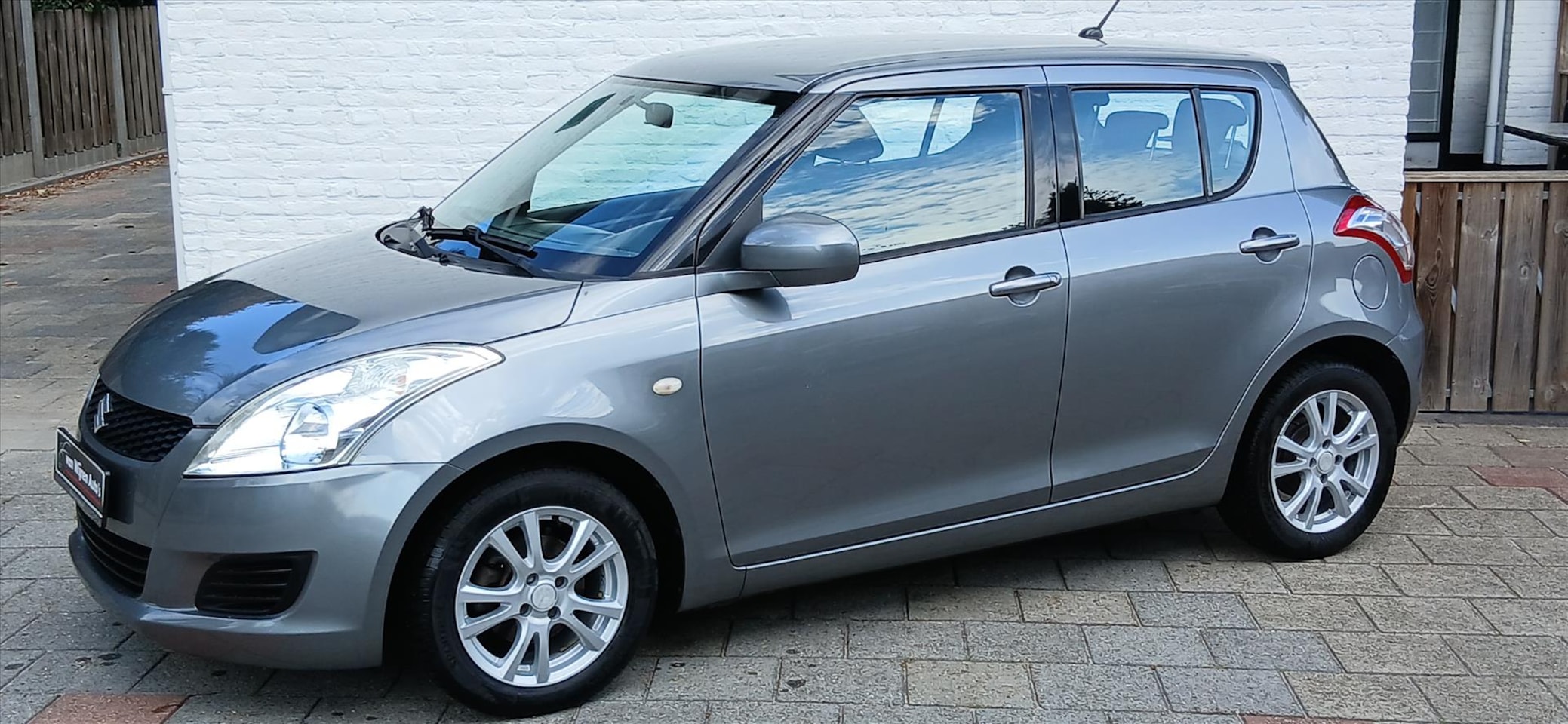 Suzuki Swift - 1.2 5 drs comfort airco lmv 86000 km - AutoWereld.nl