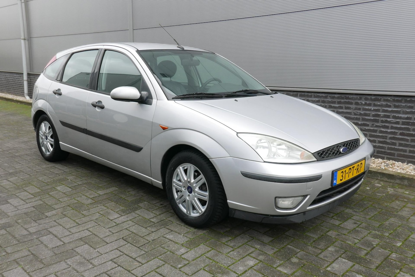 Ford Focus - 1.6-16V Ghia CLIMA,LEER,NAVI,TREKHAAK. - AutoWereld.nl