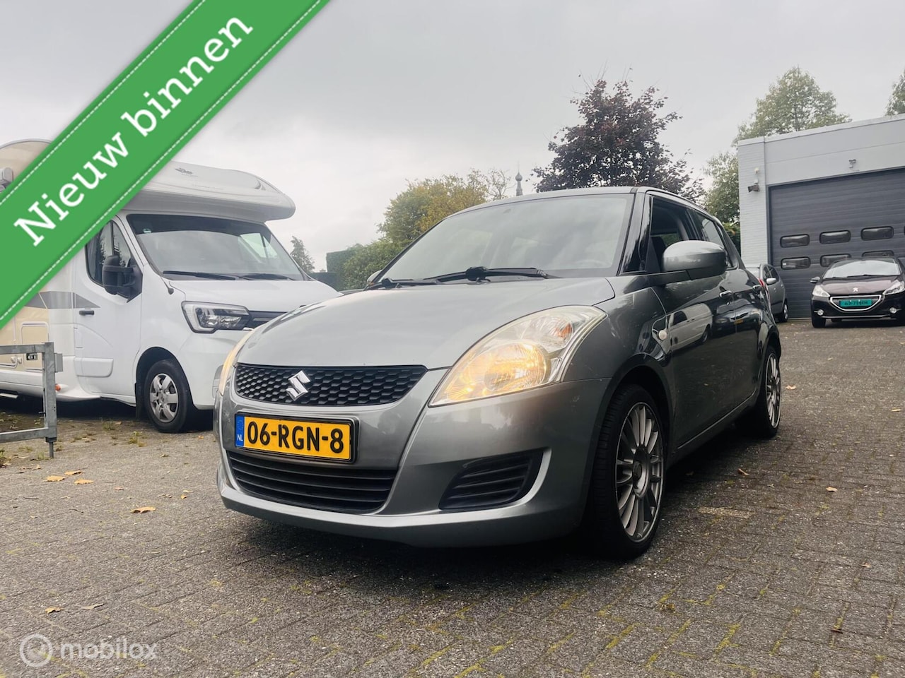 Suzuki Swift - 1.2 Sport-line 5 Deurs Airco / Multimedia / LM - AutoWereld.nl