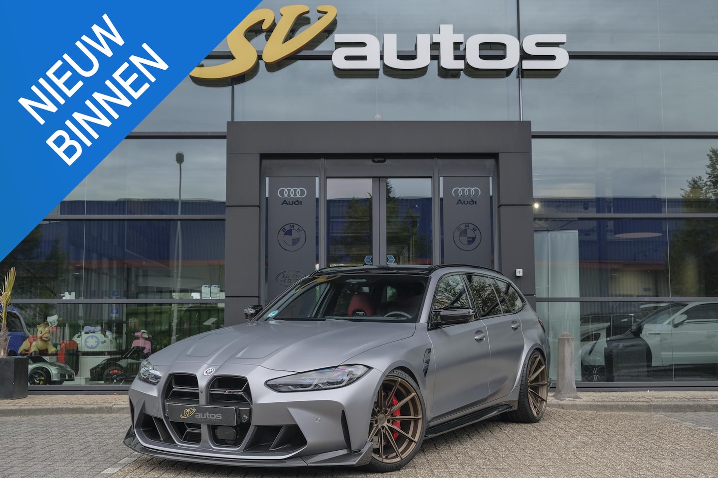 BMW 3-serie Touring - M3 Competition 510pk xDrive Widescreen Frozen grey *BTW* Head-up Adaptive cruise CSL grill - AutoWereld.nl