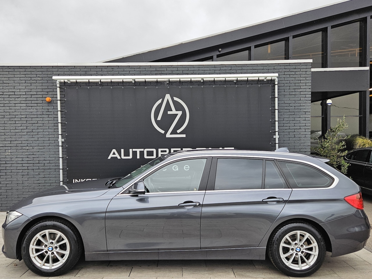 BMW 3-serie Touring - 320i High Executive *AC*Navi*Automaat - AutoWereld.nl