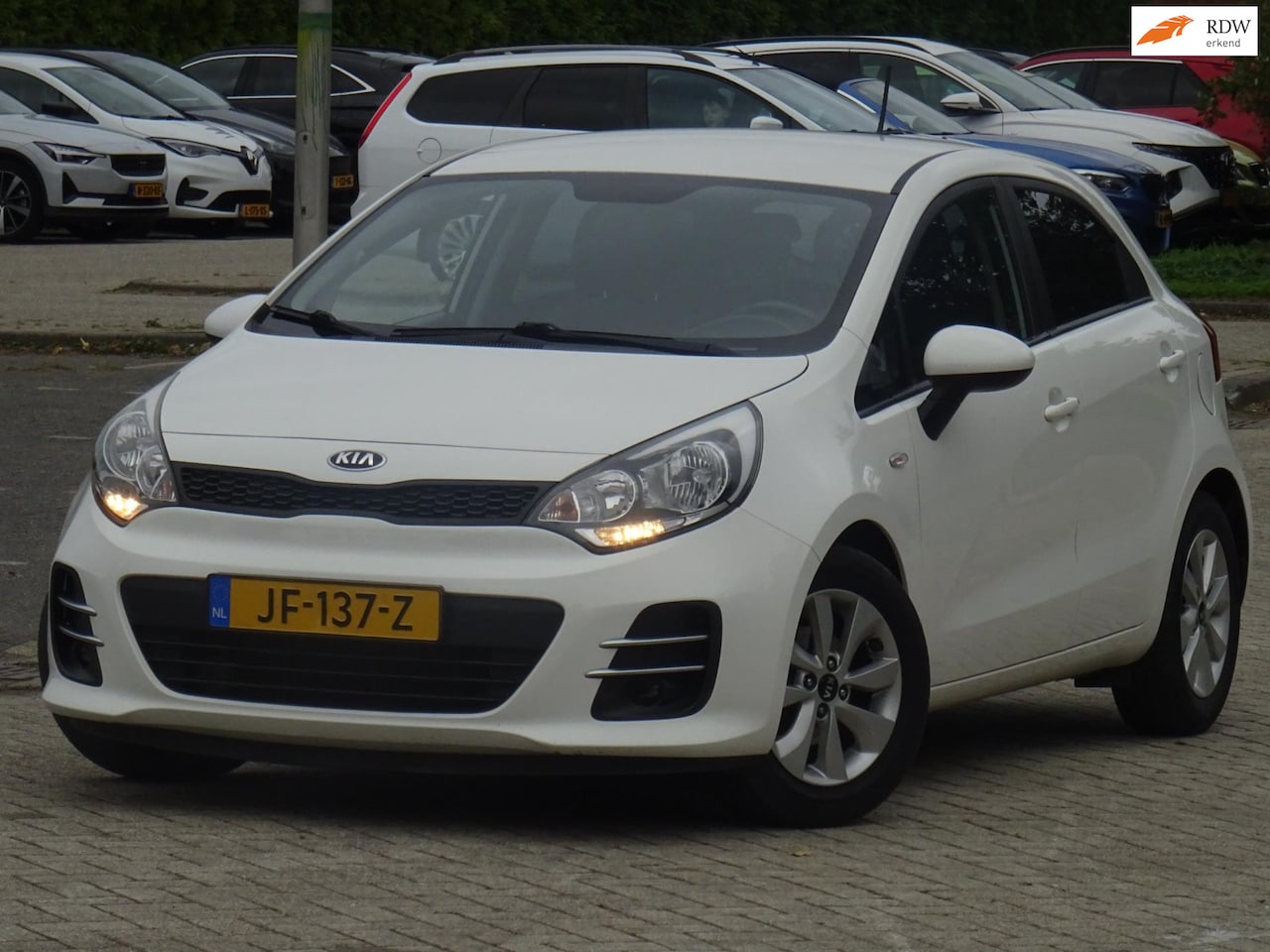 Kia Rio - 1.2 CVVT ComfortPlusLine Navigator NAP/NAVI/CAMERA - AutoWereld.nl