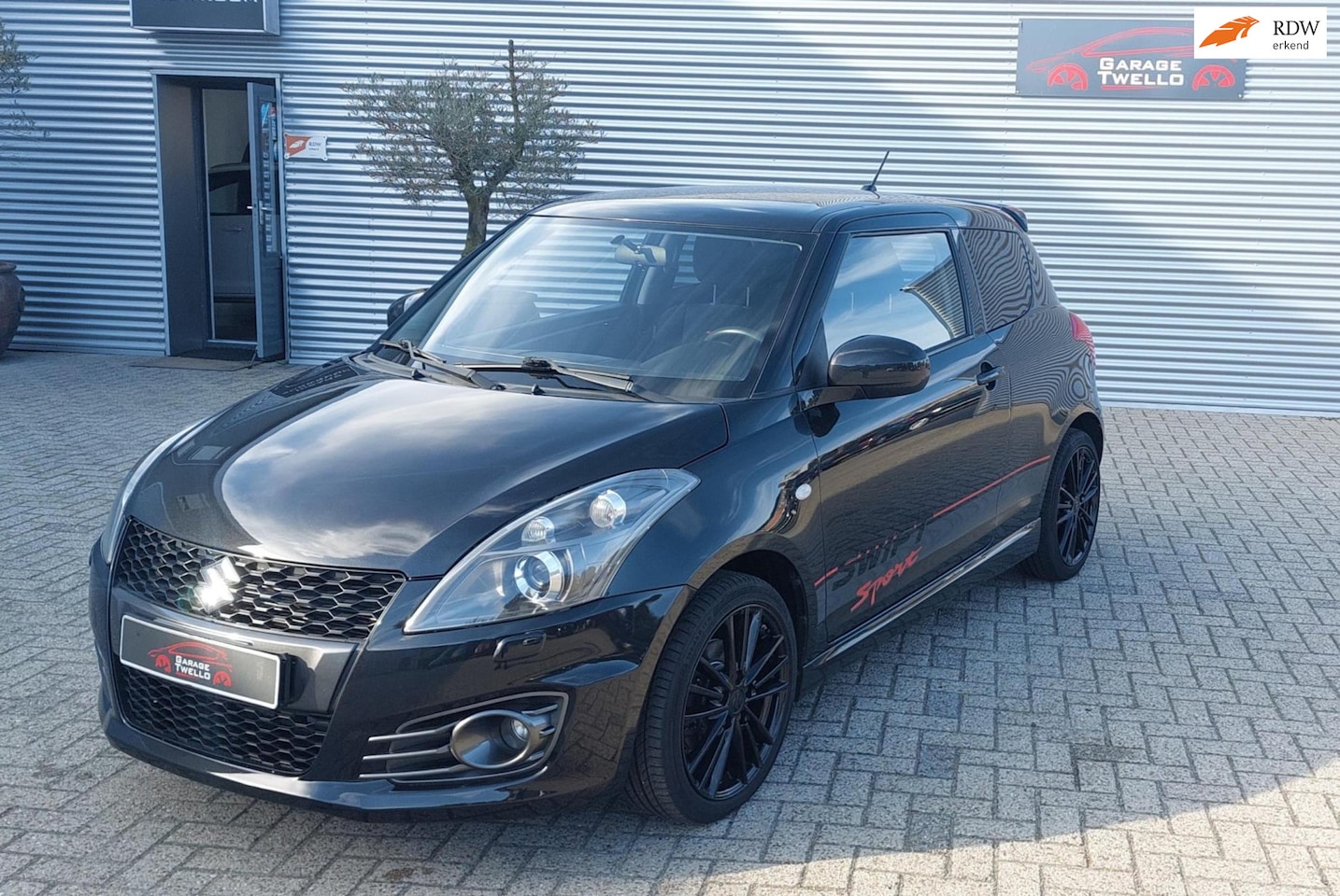 Suzuki Swift - 1.6 Sport airco,stoel verwarming,lm,enz. - AutoWereld.nl
