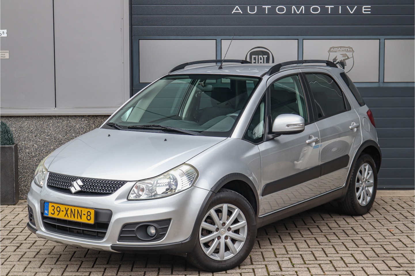 Suzuki SX4 - 1.6 Executive 2e eig Navi Climate Keyless Stoelverwarming - AutoWereld.nl