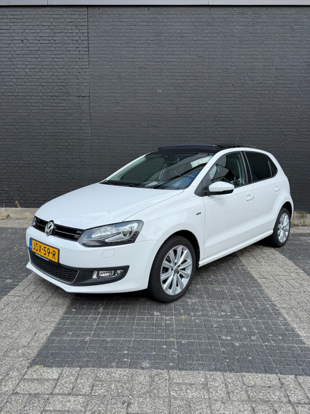 Volkswagen Polo - Volkswagen Polo 1.2 TSI Life PANO 2013 - AutoWereld.nl