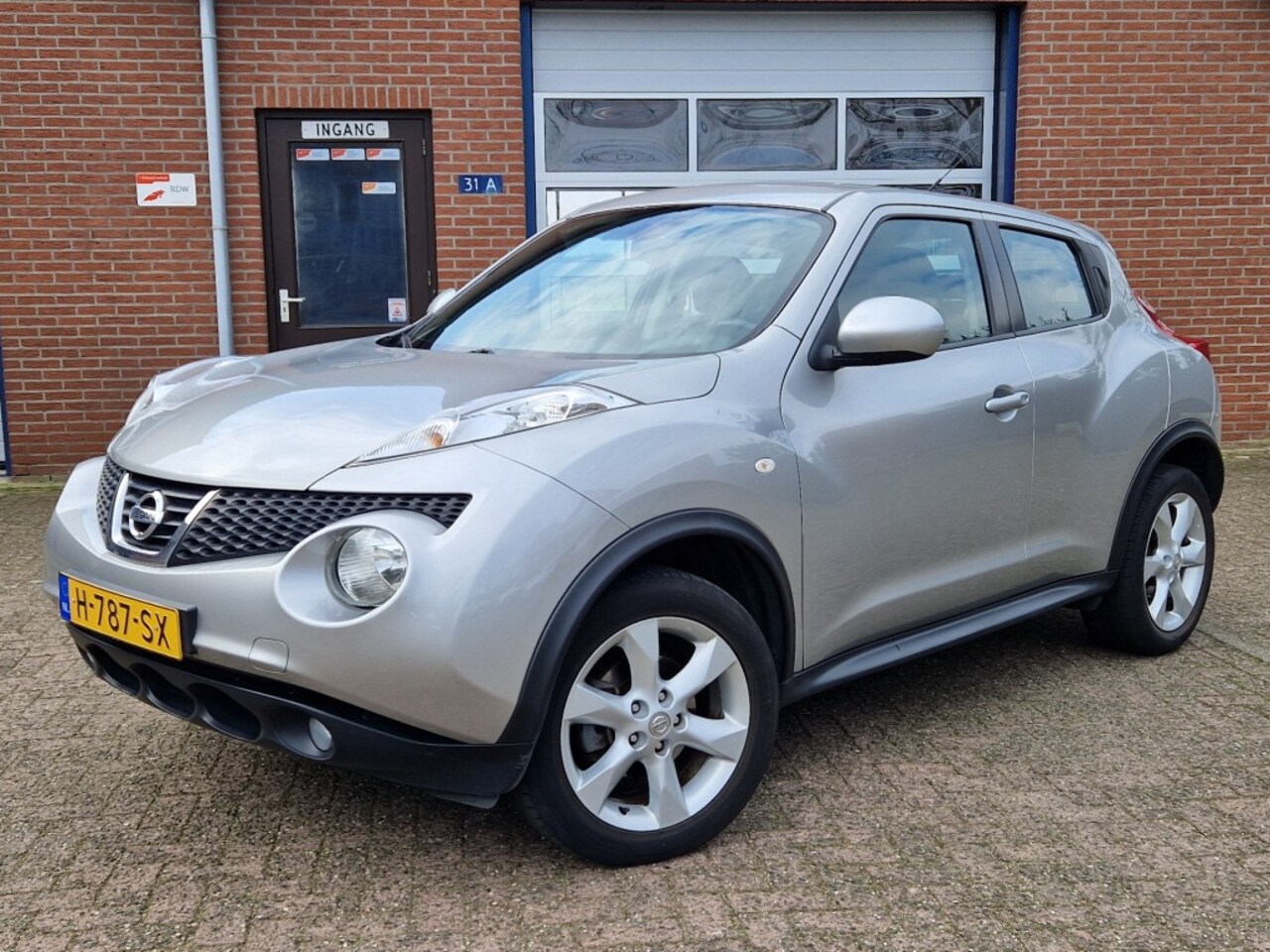 Nissan Juke - 1.6i Acenta Navi Climate control Cruise control - AutoWereld.nl