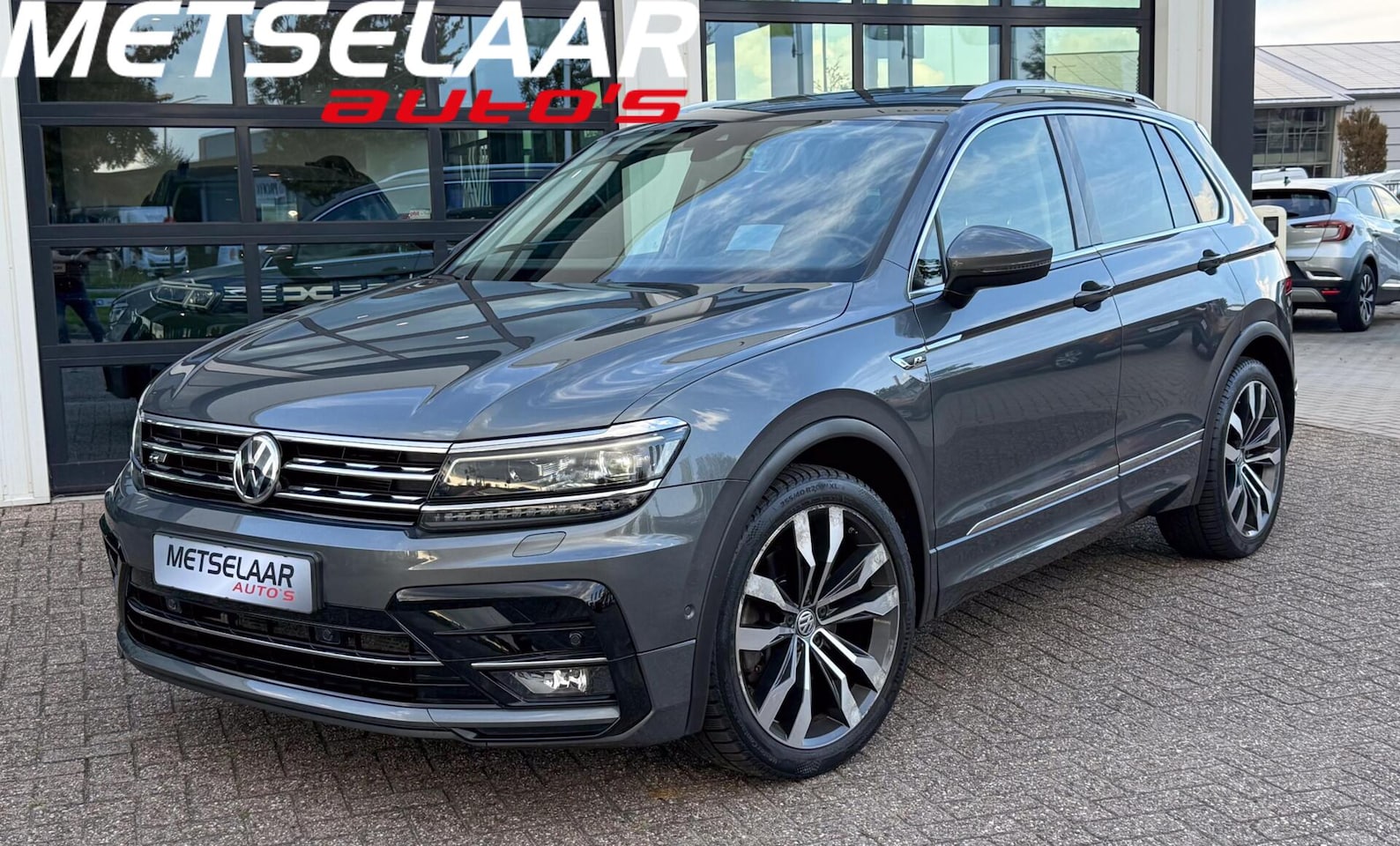 Volkswagen Tiguan - 2.0 TSI 4Motion Highline Business R Panodak - AutoWereld.nl