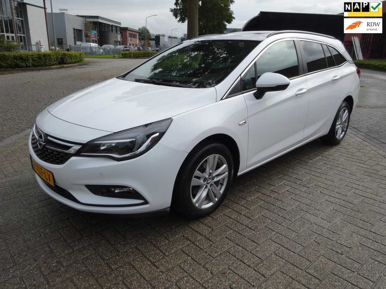 Opel Astra Sports Tourer - 1.4 Innovation/Airco/Navi/Cruis/Boekjes/Automaat - AutoWereld.nl