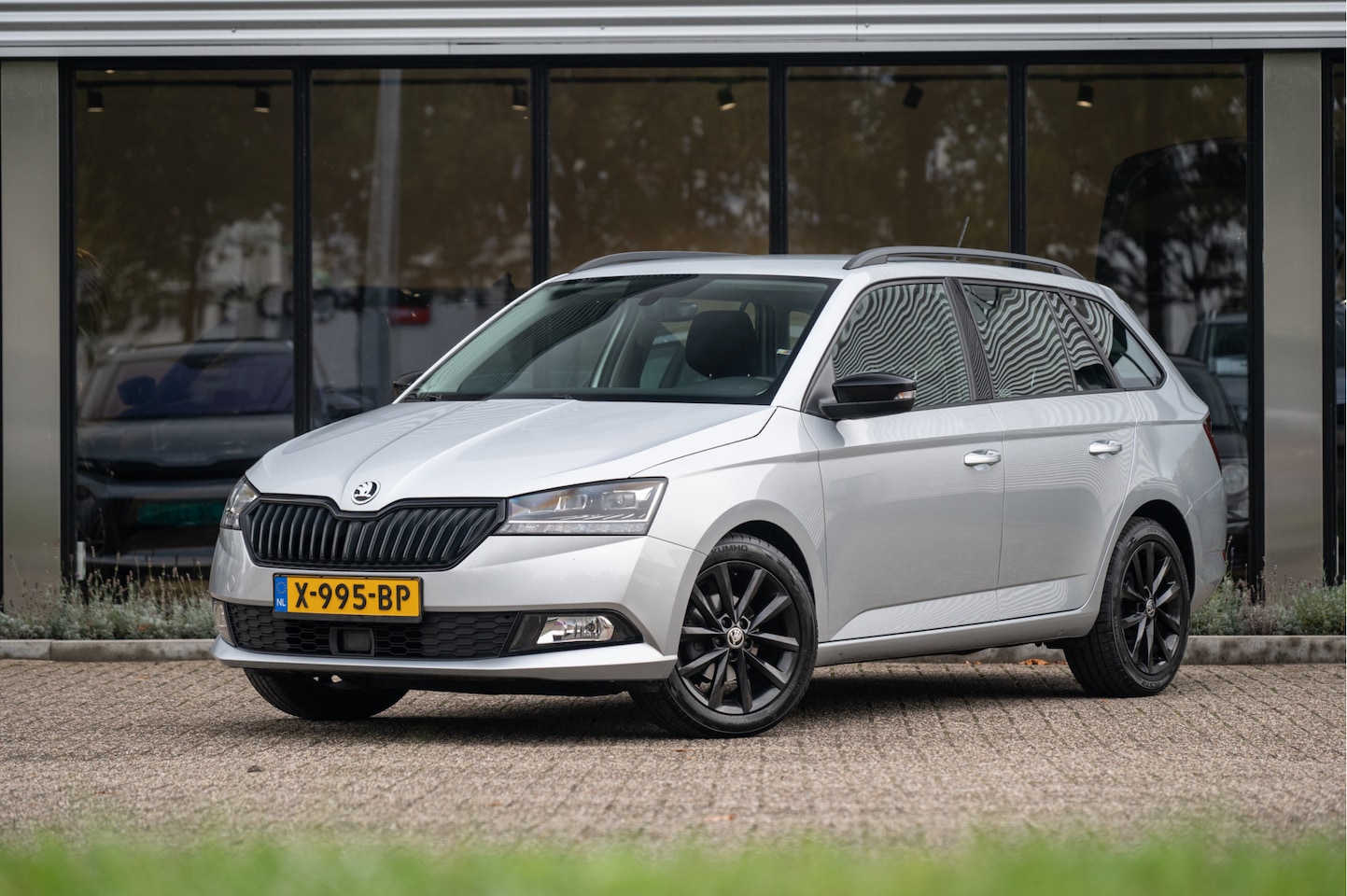 Skoda Fabia Combi - 1.0 TSI Sport Business | Navi by App | Cruise | LED | PDC - AutoWereld.nl