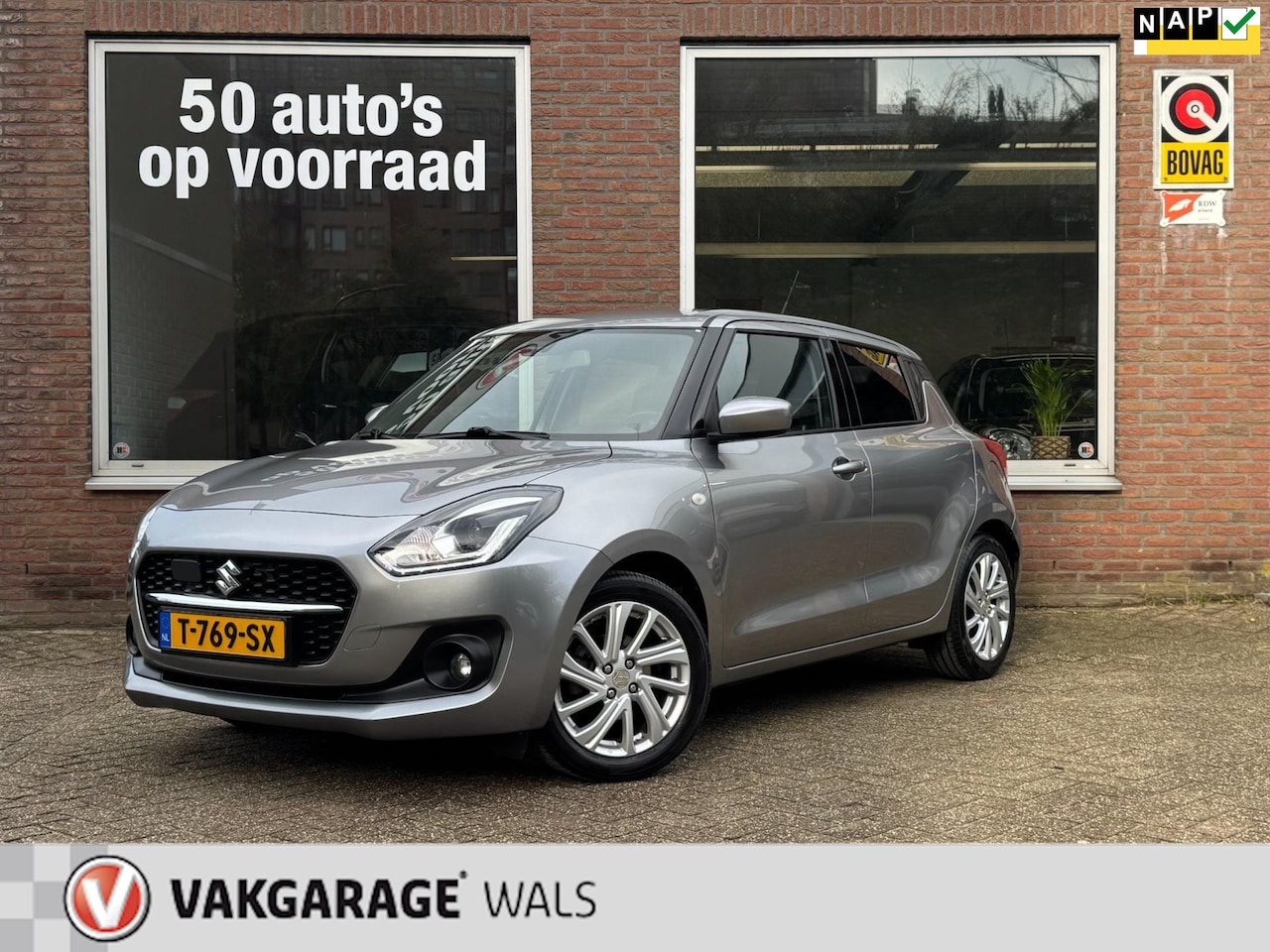 Suzuki Swift - 1.2 STIJL SMART HYBRID | AIRCO | NAVI | LANE-ASSIST | DEALER | CAMERA - AutoWereld.nl