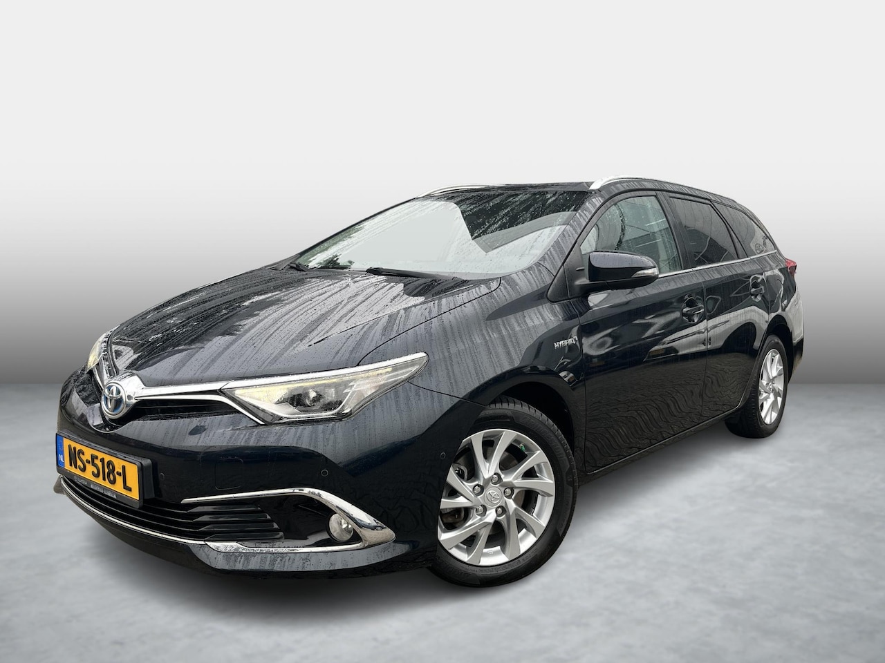 Toyota Auris Touring Sports - 1.8 Hybrid Executive panoramadak - AutoWereld.nl