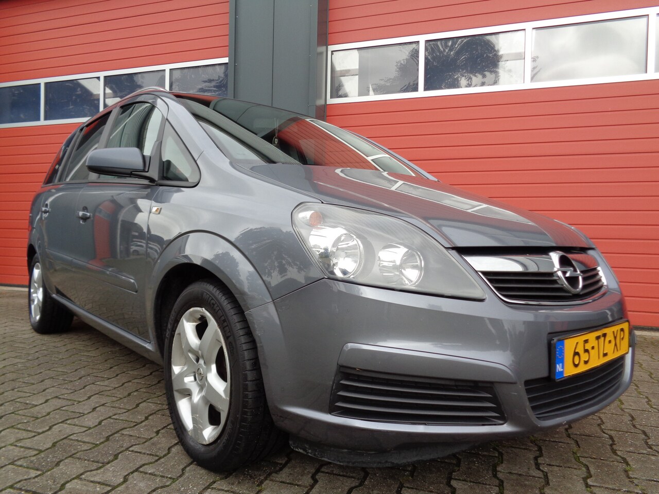Opel Zafira - 1.8 Business 141PK Airco Cruise LMV 7-Pers NL-Auto Trekhaak - AutoWereld.nl