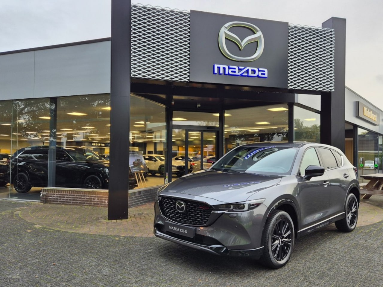Mazda CX-5 - E- SKYACTIV-G 165 6AT M-HYBRID  HOMURA / 360Camera - AutoWereld.nl