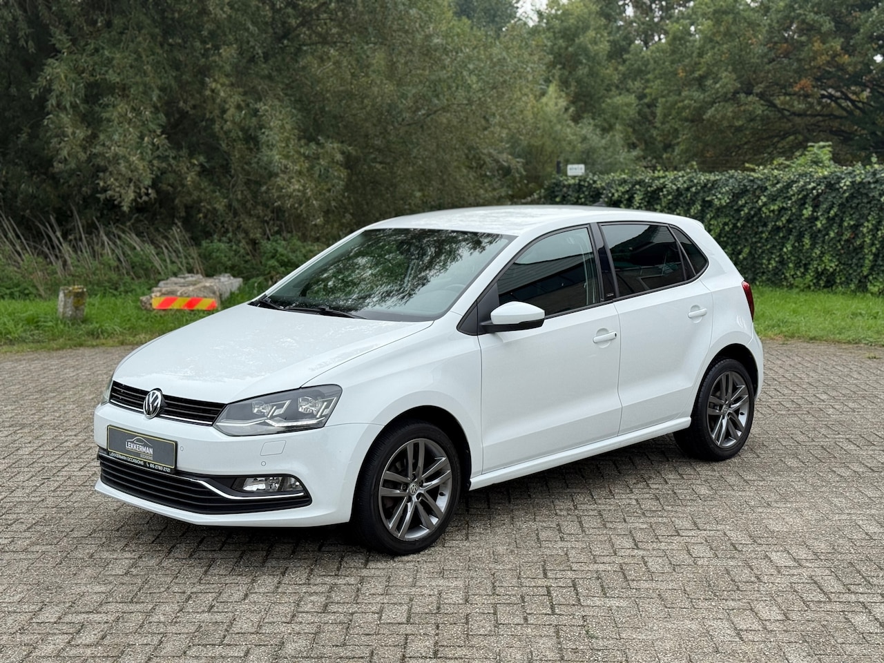 Volkswagen Polo - 1.2 TSI High Line LED I 1E EIG I PDC I NAVI I ZEER MOOI I 90PK - AutoWereld.nl