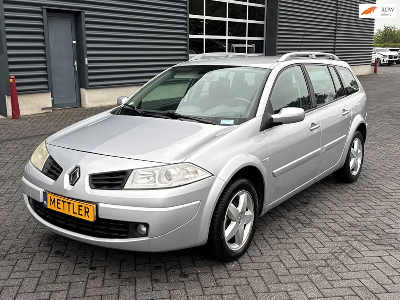 Renault Mégane Grand Tour - 2.0-16V Business Line 2.0-16V Business Line, airco, cruise control, trekhaak - AutoWereld.nl