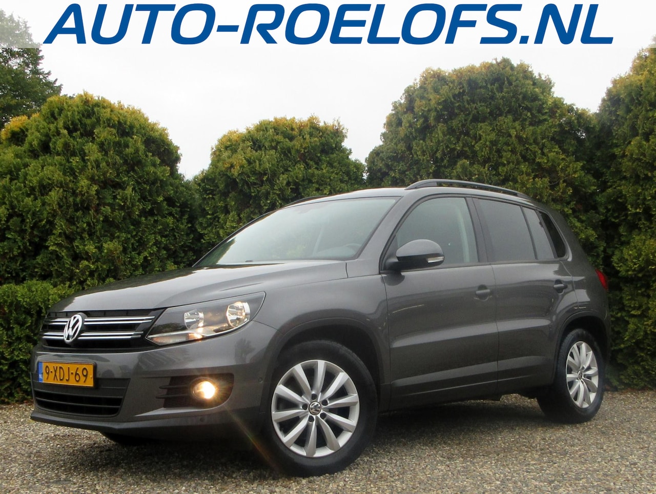Volkswagen Tiguan - 1.4 TSI Comfort&Design Edition *Navi*ECC* - AutoWereld.nl