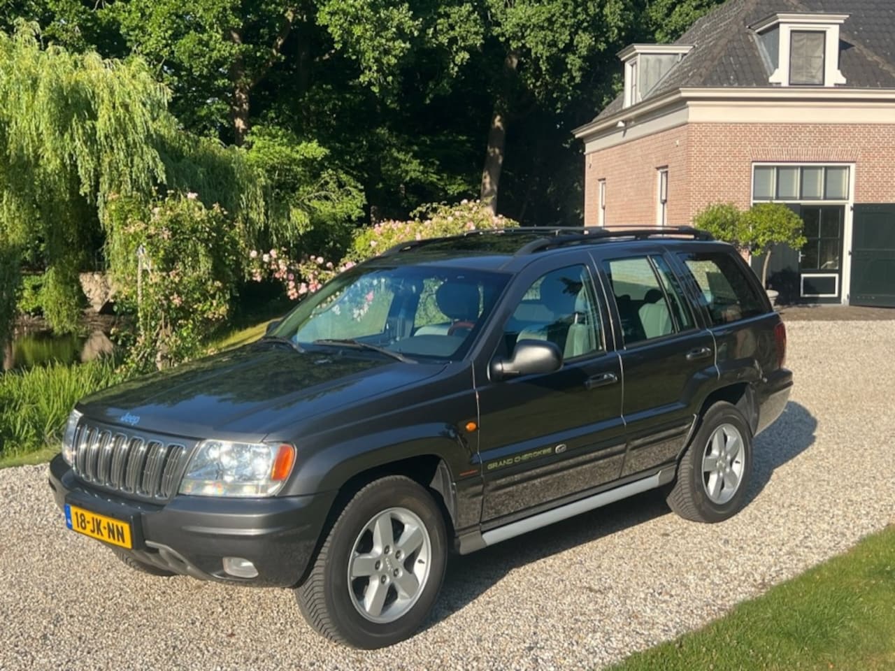 Jeep Grand Cherokee - 4.7 V8 Quadradrive automaat 1e eigenaar NL auto BTW - AutoWereld.nl