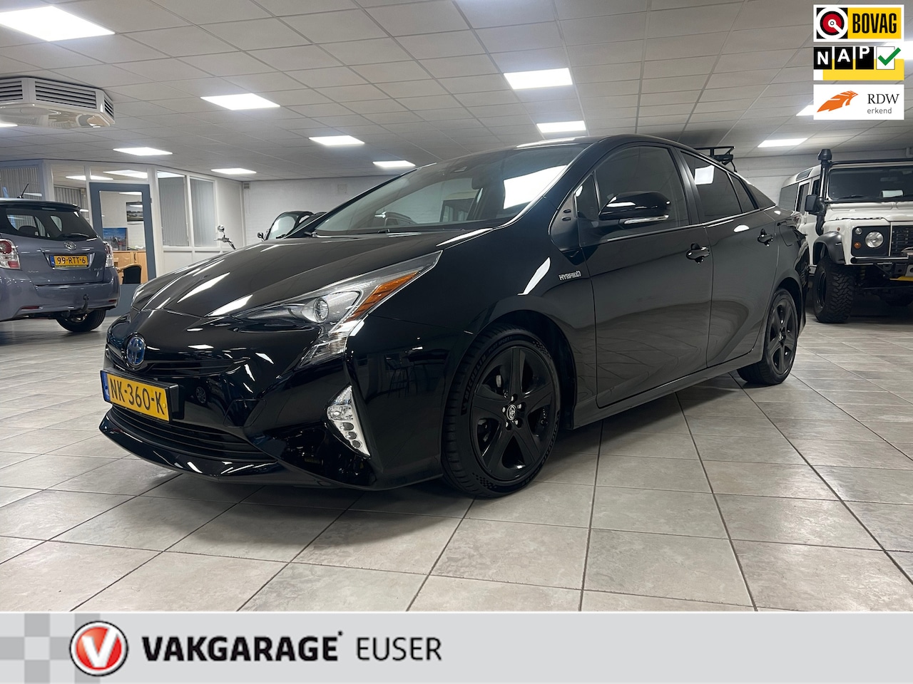Toyota Prius - 1.8 First Edition Dealer onderhouden. Navigatie, Climate controle, Achteruitrijcamera. - AutoWereld.nl