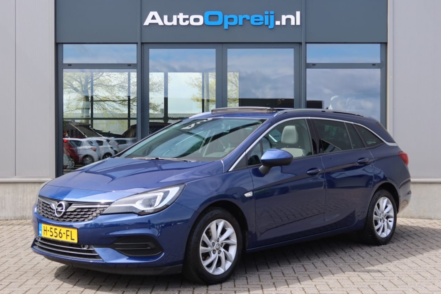 Opel Astra Sports Tourer - 1.2 Sports Tourer Elegance Clima, NAVI, Schuif/kantel dak, Cruise, PDC v+a, St - AutoWereld.nl