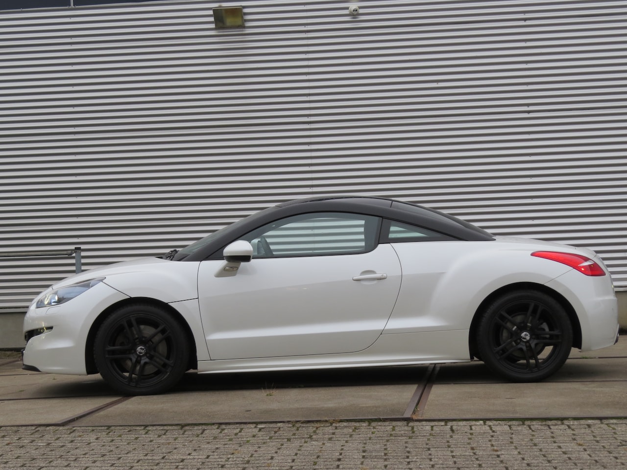 Peugeot RCZ - 1.6 THP Brownstone - AutoWereld.nl