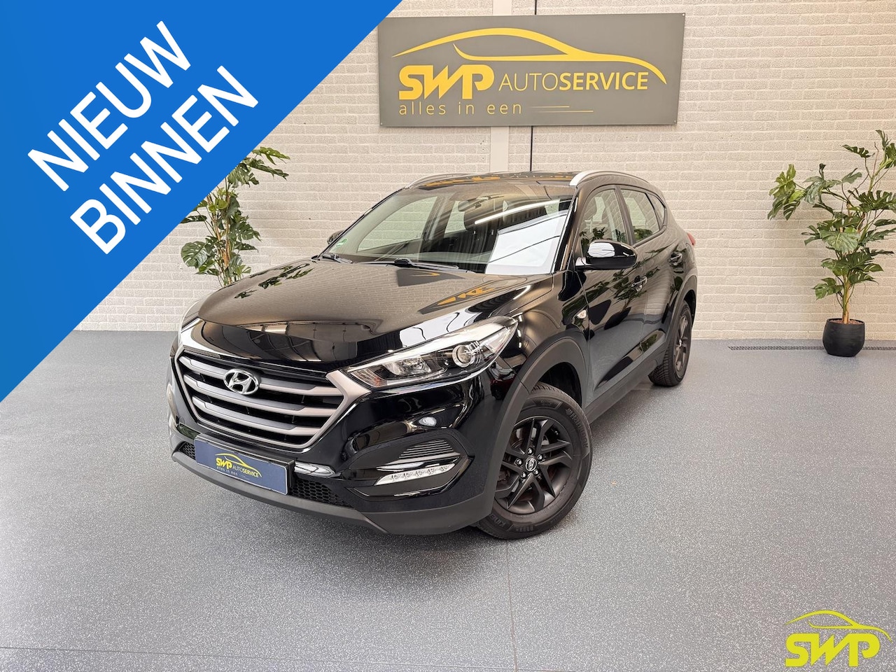 Hyundai Tucson - 1.6 GDi Comfort | Navi | Cam | trekhaak - AutoWereld.nl