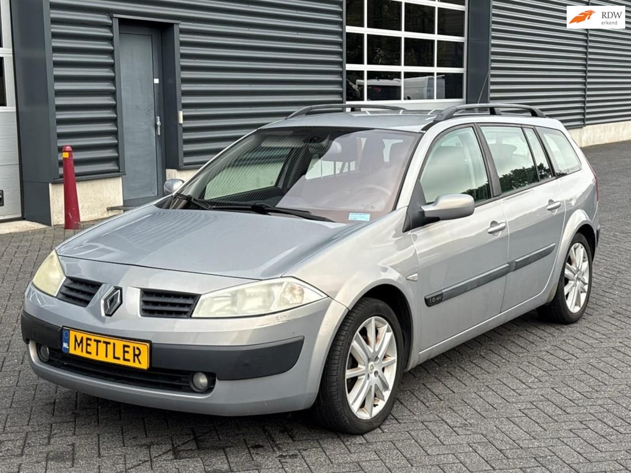 Renault Mégane Grand Tour - 1.6-16V Expression Basis 1.6-16V Expression Basis, airco, cruise control, trekhaak - AutoWereld.nl
