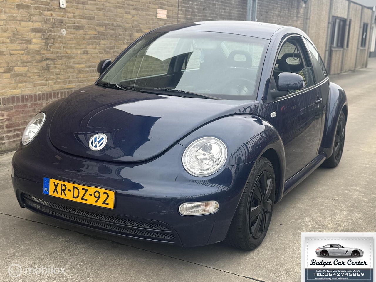 Volkswagen New Beetle - 2.0 Highline 2.0 Highline - AutoWereld.nl