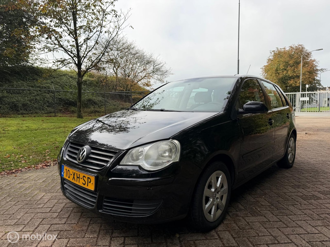Volkswagen Polo - 1.4-16V Optive / airco - AutoWereld.nl
