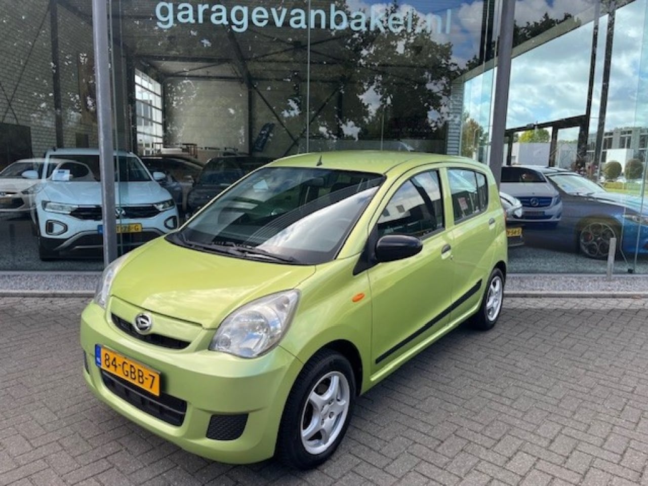Daihatsu Cuore - 1.0 12V AUTOMAAT AIRCO - AutoWereld.nl