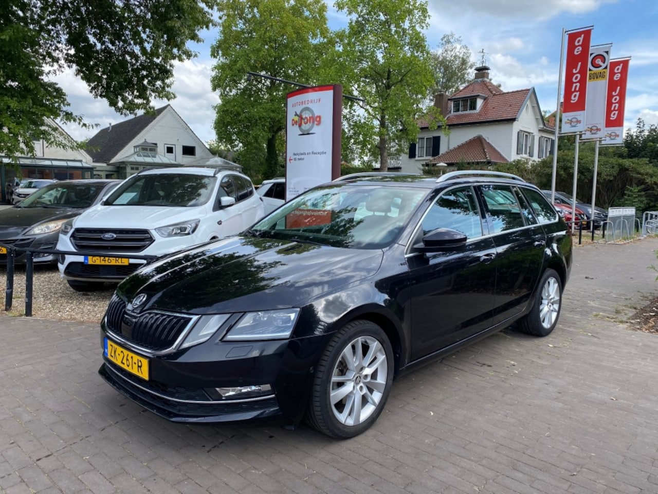 Skoda Octavia Combi - COMBI 1.0 TSI STYLE AUTOMAAT / AIRCO-ECC / CARPLAY / TREKHAAK / PDC - AutoWereld.nl